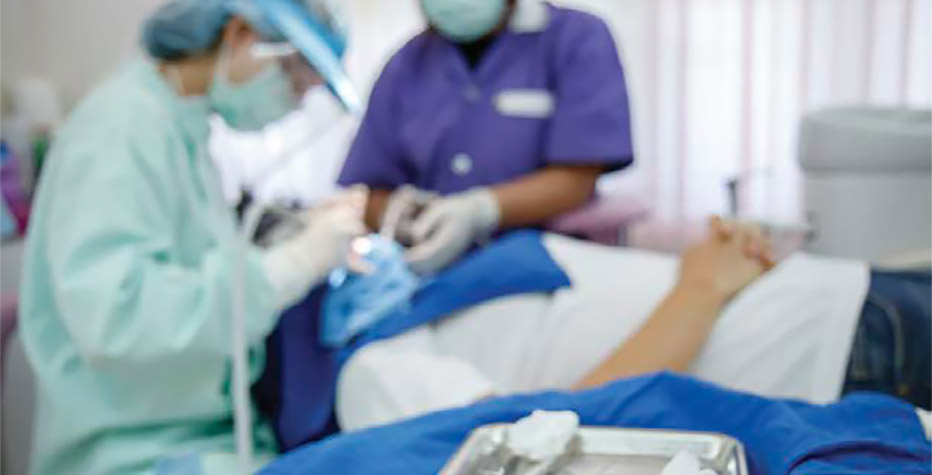 dentists working on patient