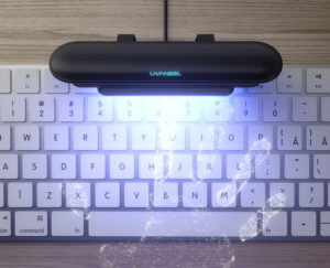 UV light cleaning a keyboard